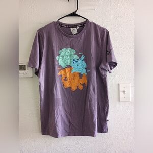 Puma Pokemon Purple Tee with Orange and Blue Graphics